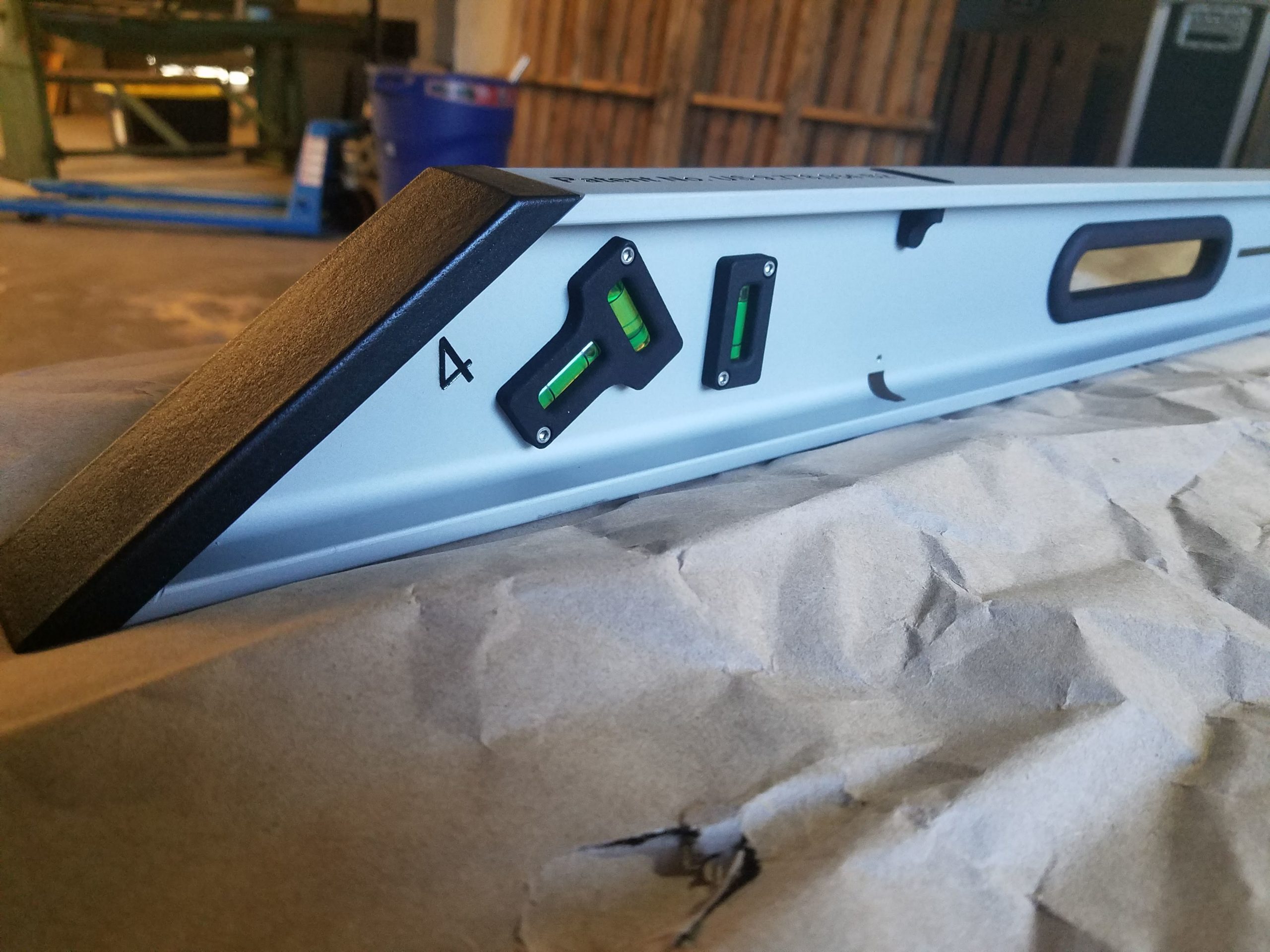 The photograph shows a closeup of the 36.87-degree beveled edge of The Right Level.
